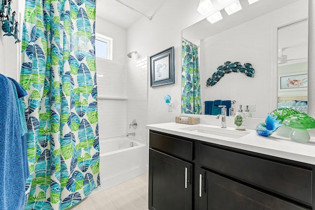 bathroom with shower / bath combination with curtain and vanity