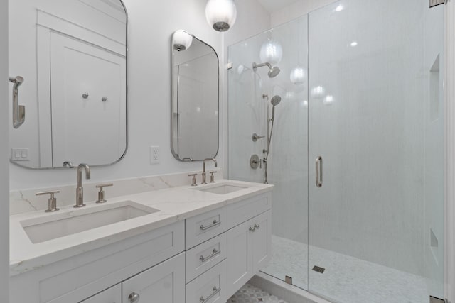 bathroom with vanity and an enclosed shower