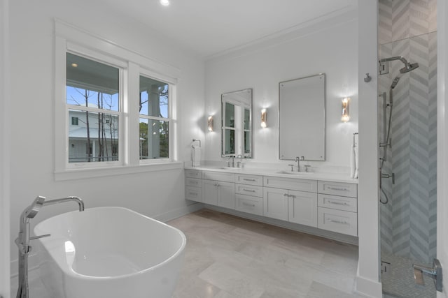 bathroom with independent shower and bath, crown molding, and vanity