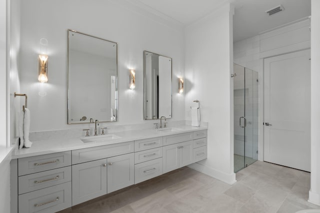 bathroom with walk in shower, vanity, and crown molding