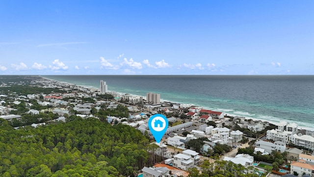 birds eye view of property featuring a view of the beach and a water view