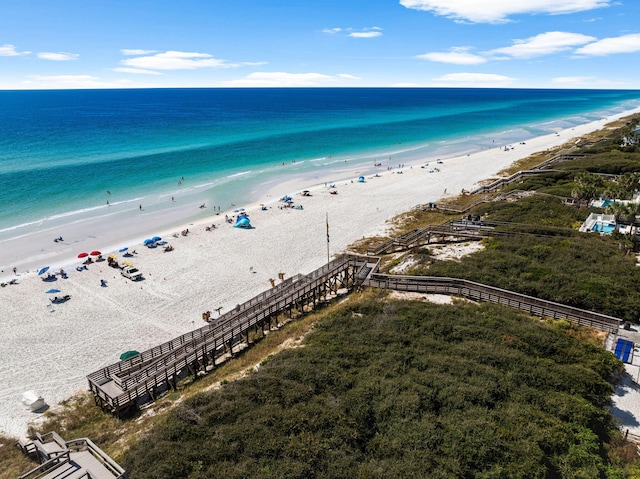 aerial view with a beach view and a water view