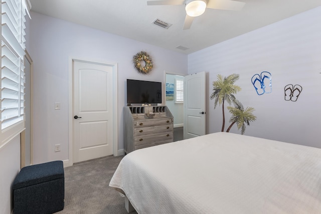 carpeted bedroom with ceiling fan