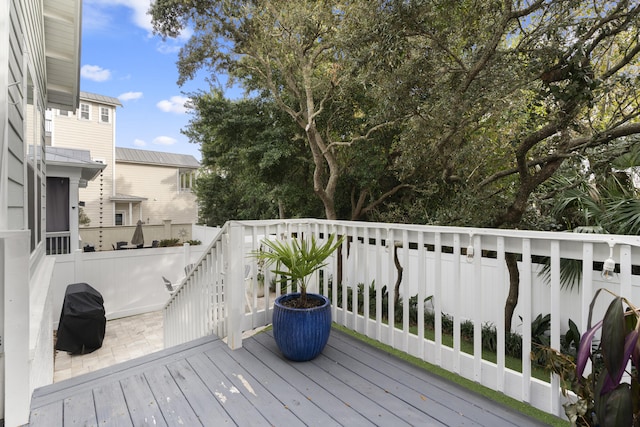 wooden deck with area for grilling