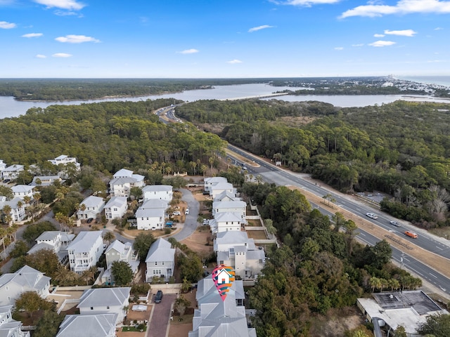 bird's eye view with a water view