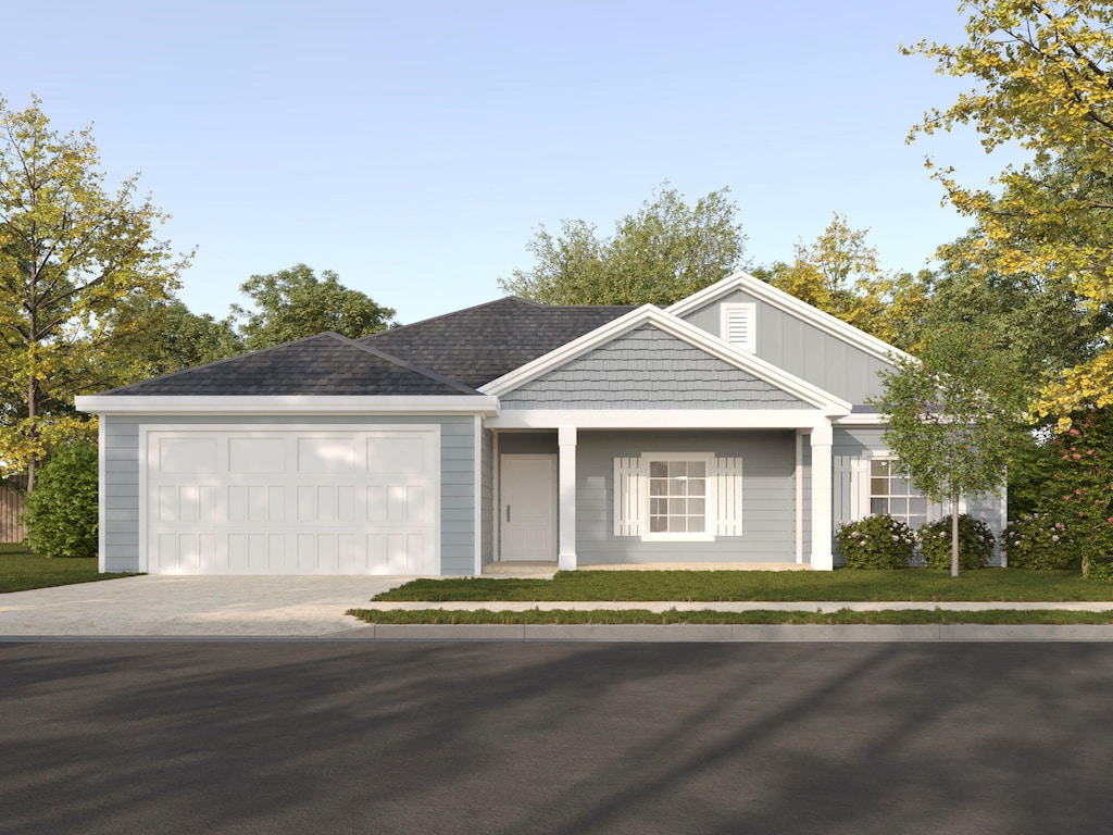 view of front of home with a garage