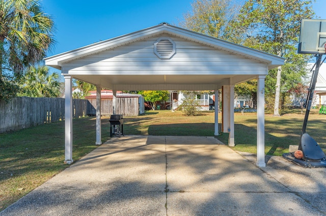 view of car parking with a carport and a lawn