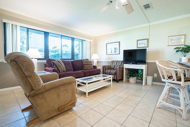 tiled living room featuring ceiling fan and ornamental molding