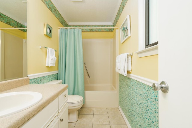 full bathroom featuring shower / tub combo with curtain, tile patterned floors, toilet, ornamental molding, and vanity