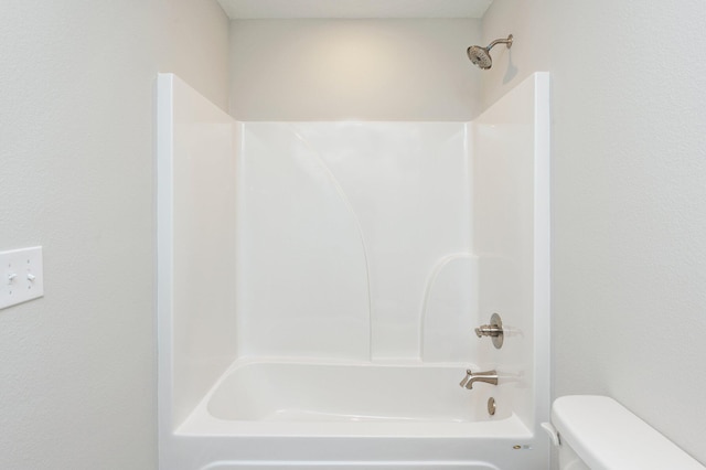 full bath with toilet and shower / bath combination