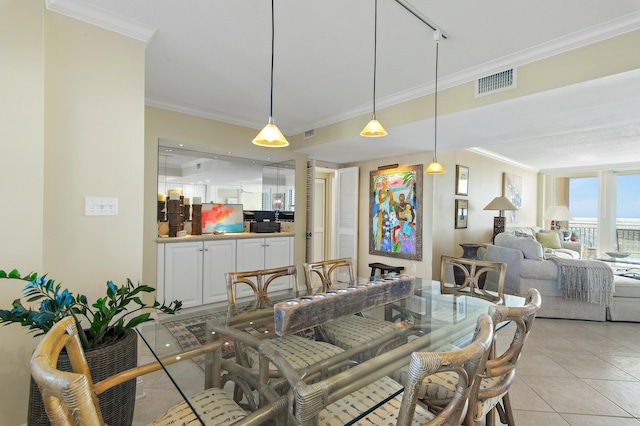 tiled dining area with ornamental molding