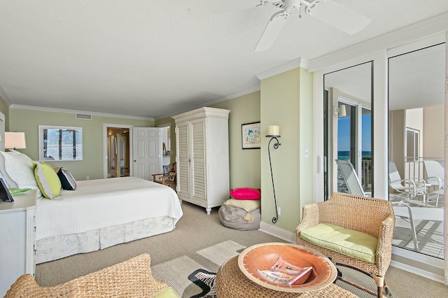 carpeted bedroom with access to exterior, crown molding, and ceiling fan