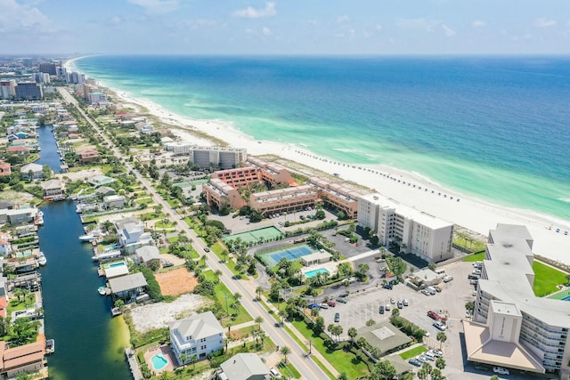 birds eye view of property with a view of the beach and a water view