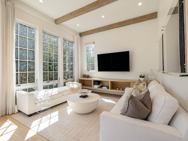 interior space featuring beam ceiling