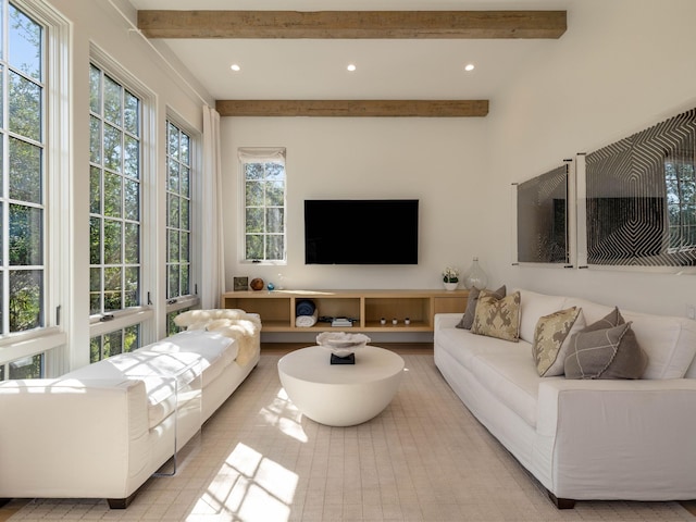 living room with beam ceiling