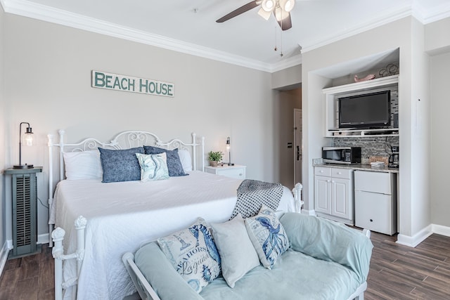 bedroom featuring ornamental molding, fridge, and ceiling fan