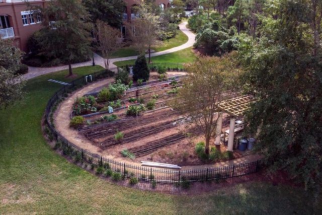 view of home's community featuring a yard