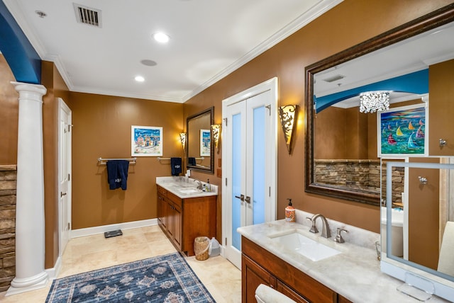 bathroom with crown molding, vanity, tile patterned flooring, and ornate columns