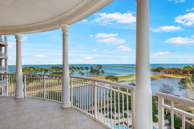 balcony featuring a water view