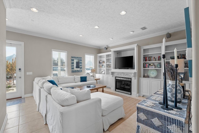 tiled living room with ornamental molding, a premium fireplace, and a textured ceiling