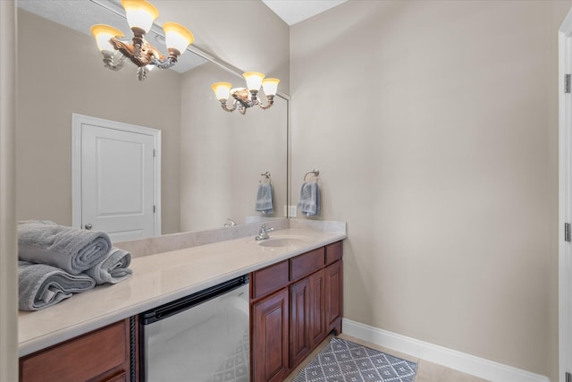 bathroom featuring an inviting chandelier and vanity