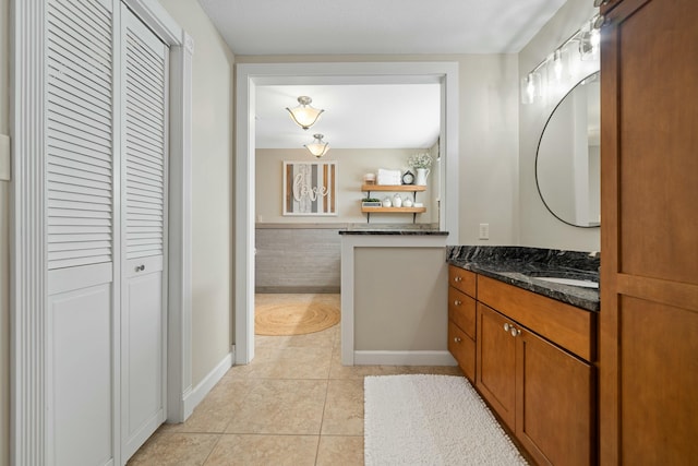 bathroom featuring vanity and tile patterned flooring