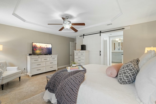 bedroom featuring light tile patterned flooring, a barn door, and ceiling fan