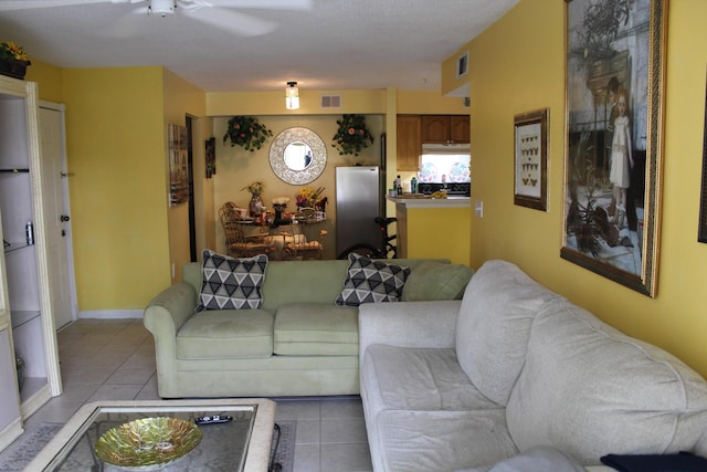 living room with light tile patterned floors