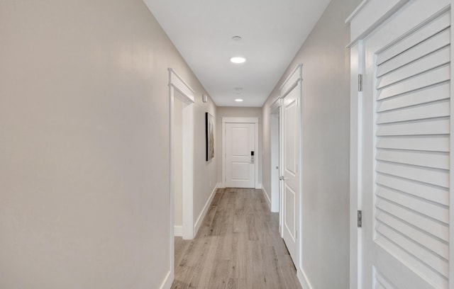 corridor featuring light hardwood / wood-style flooring