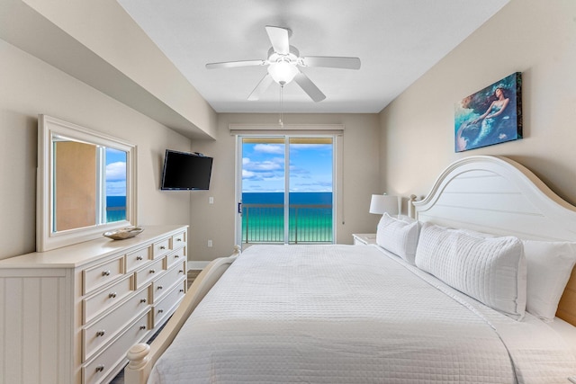 bedroom featuring ceiling fan, multiple windows, and access to outside