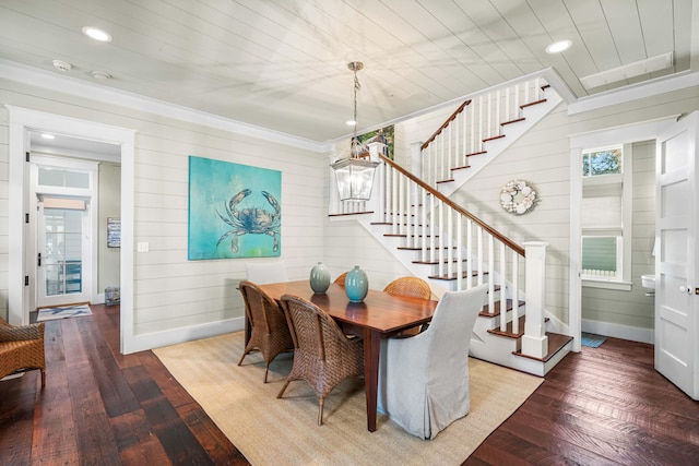 dining space featuring hardwood / wood-style flooring, baseboards, stairway, and recessed lighting