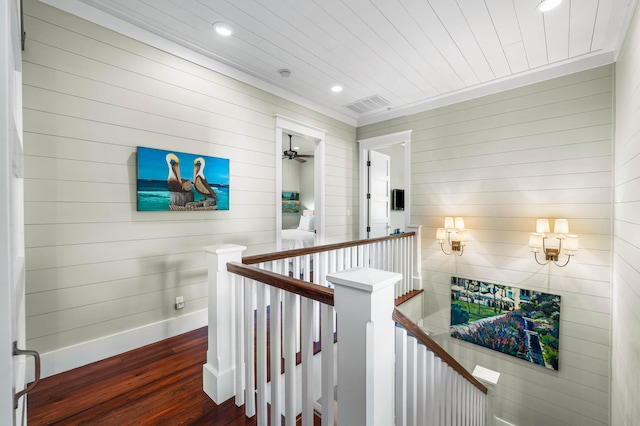 corridor with recessed lighting, visible vents, an upstairs landing, baseboards, and dark wood-style floors