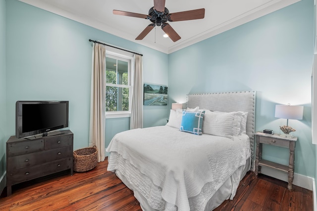 bedroom with ceiling fan, wood-type flooring, and baseboards