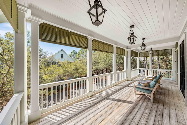 sunroom / solarium with wooden ceiling