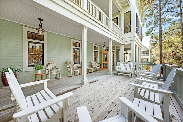 wooden terrace featuring a porch