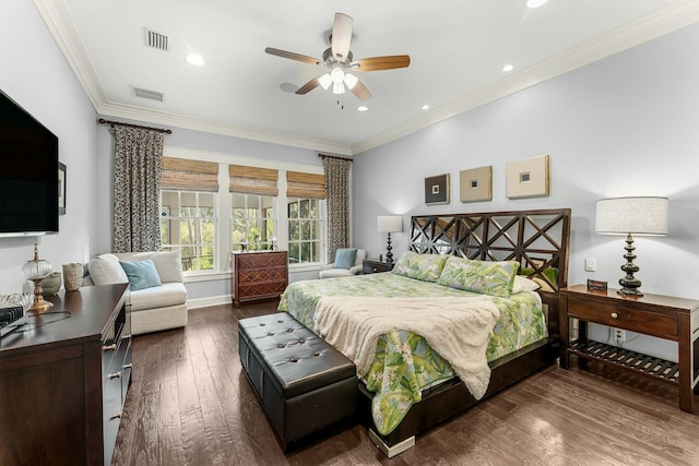 bedroom with visible vents, recessed lighting, crown molding, and dark wood-style flooring