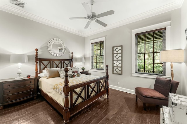 bedroom with baseboards, visible vents, dark wood-style flooring, ceiling fan, and crown molding