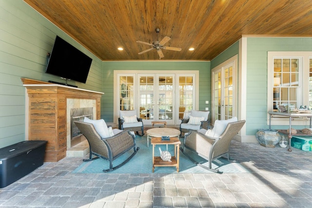 view of patio / terrace featuring french doors, an outdoor hangout area, and a ceiling fan