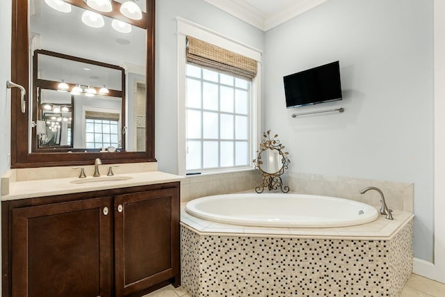 full bathroom with tile patterned floors, ornamental molding, vanity, and a bath