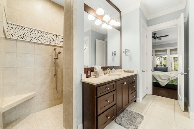 ensuite bathroom with vanity, ornamental molding, walk in shower, tile patterned floors, and connected bathroom