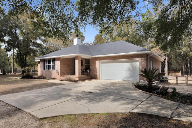 ranch-style house featuring a garage