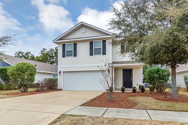 view of front of property with a garage and central AC unit