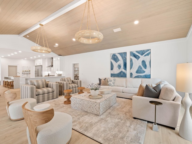 living room with wooden ceiling, vaulted ceiling with beams, and light hardwood / wood-style flooring