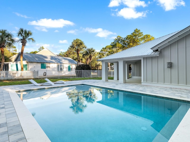 view of pool featuring a patio area