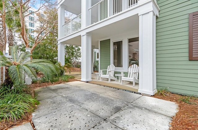 property entrance featuring a patio