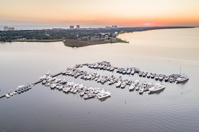 aerial view at dusk with a water view