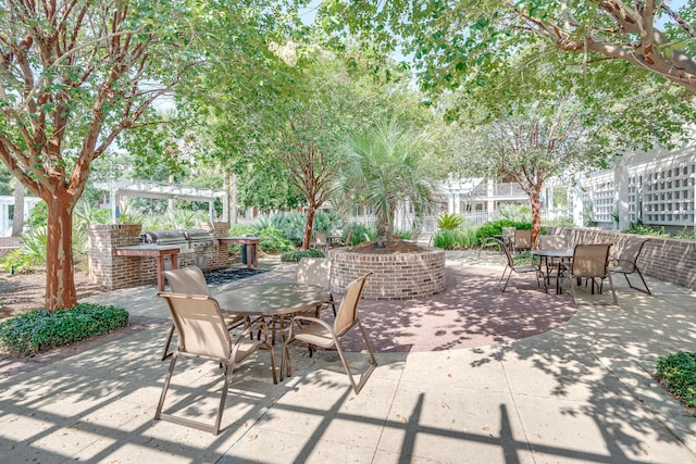 view of patio with a pergola and exterior kitchen