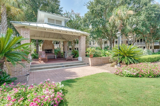 surrounding community featuring a yard and a gazebo