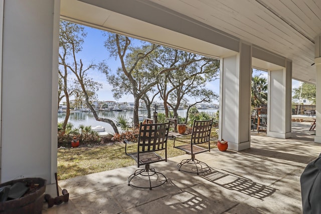 view of patio / terrace featuring a water view