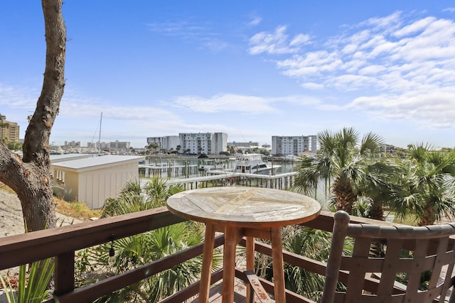 balcony featuring a water view